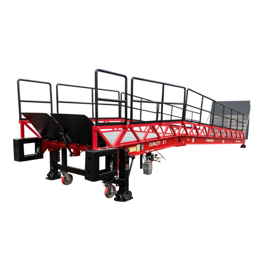 Rampa móvil STAR OTC de 8000 kg: robusta, segura y versátil. Perfecta para uso industrial y centros de formación. Barandillas desmontables y superficie antideslizante para mayor seguridad.